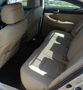 hyundai genesis 2012 beige sedan 4dr sdn v6 gasoline 6 cylinders rear wheel drive automatic 75070