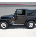 jeep wrangler 2006 black suv 65 gasoline 6 cylinders 4 wheel drive 6 speed manual 78028