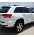 jeep grand cherokee 2012 white suv overland gasoline 8 cylinders 2 wheel drive 6 speed automatic 77450