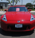 nissan 370z 2009 red coupe gasoline 6 cylinders rear wheel drive automatic 76087
