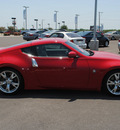 nissan 370z 2009 red coupe gasoline 6 cylinders rear wheel drive automatic 76087