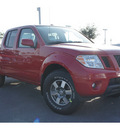 nissan frontier 2011 red pro 4x gasoline 6 cylinders 2 wheel drive automatic 78552