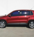volkswagen tiguan 2010 red suv gasoline 4 cylinders front wheel drive automatic 78577