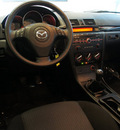 mazda mazda3 2009 black sedan i touring value gasoline 4 cylinders front wheel drive 5 speed manual 75062