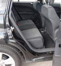 dodge caliber 2010 black hatchback sxt gasoline 4 cylinders front wheel drive automatic 79925