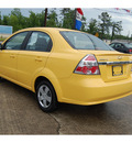 chevrolet aveo 2010 yellow sedan lt gasoline 4 cylinders front wheel drive automatic with overdrive 77662