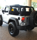 jeep wrangler 2012 silver suv sport gasoline 6 cylinders 4 wheel drive 6 speed manual 76011