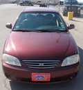 kia spectra 2003 red sedan gasoline 4 cylinders dohc front wheel drive automatic 79936