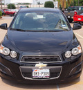 chevrolet sonic 2012 black hatchback ls gasoline 4 cylinders front wheel drive automatic 77581