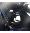 cadillac cts 2007 black sedan gasoline 6 cylinders rear wheel drive automatic 77074