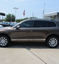 volkswagen touareg 2011 brown suv vr6 sport gasoline 6 cylinders all whee drive shiftable automatic 77074