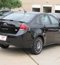 ford focus 2011 black sedan sport ses gasoline 4 cylinders front wheel drive automatic with overdrive 77074