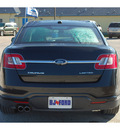 ford taurus 2010 black sedan limited gasoline 6 cylinders front wheel drive automatic 77575
