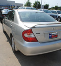 toyota camry 2004 silver sedan se v6 gasoline 6 cylinders front wheel drive automatic 75034