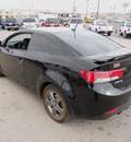 kia forte 2011 black coupe gasoline 4 cylinders front wheel drive standard 79936