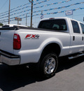 ford f 350 super duty 2010 white xlt gasoline 10 cylinders 4 wheel drive automatic with overdrive 32401