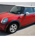 mini cooper 2009 red hatchback gasoline 4 cylinders front wheel drive 6 speed manual 78729