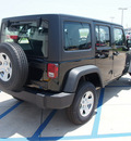 jeep wrangler unlimited 2012 dk  green suv sport gasoline 6 cylinders 4 wheel drive automatic 76230