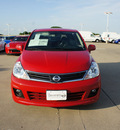 nissan versa 2012 red hatchback 1 8 sl gasoline 4 cylinders front wheel drive cont  variable trans  75150
