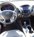 hyundai tucson 2011 white gasoline 4 cylinders front wheel drive automatic with overdrive 60462