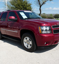 chevrolet tahoe 2011 red suv lt flex fuel 8 cylinders 2 wheel drive automatic 77802