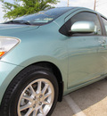 toyota yaris 2007 lt  green sedan gasoline 4 cylinders front wheel drive automatic with overdrive 77074