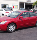 nissan altima 2009 dk  red sedan s gasoline 4 cylinders front wheel drive automatic 77802