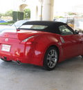 nissan 370z 2012 red roadster touring gasoline 6 cylinders rear wheel drive 6 speed manual 77477