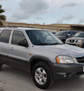 mazda tribute 2004 tan suv lx v6 gasoline 6 cylinders front wheel drive automatic with overdrive 78550