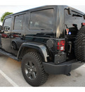 jeep wrangler unlimited 2011 black suv sport gasoline 6 cylinders 4 wheel drive automatic 78729