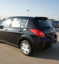 nissan versa 2012 black hatchback 1 8 s gasoline 4 cylinders front wheel drive 6 speed manual 75150