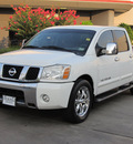 nissan titan 2005 white le flex fuel 8 cylinders rear wheel drive automatic with overdrive 77074