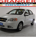 chevrolet aveo 2011 white sedan lt gasoline 4 cylinders front wheel drive automatic with overdrive 77630