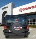 jeep wrangler unlimited 2012 black suv sport gasoline 6 cylinders 4 wheel drive 6 speed manual 75067
