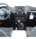 jeep wrangler unlimited 2012 dozer suv sport gasoline 6 cylinders 4 wheel drive 6 speed manual 77450