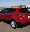 hyundai tucson 2010 red suv gasoline 4 cylinders front wheel drive automatic 76087