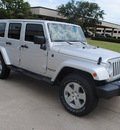 jeep wrangler 2012 silver suv unlimited sahara gasoline 6 cylinders 4 wheel drive automatic 76011