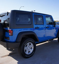 jeep wrangler unlimited 2012 blue suv sport gasoline 6 cylinders 4 wheel drive automatic 76011