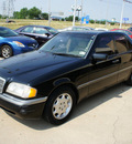 mercedes benz c class 1995 black sedan c220 gasoline 4 cylinders rear wheel drive automatic with overdrive 76108