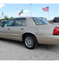 mercury grand marquis 2000 gold sedan gs gasoline v8 rear wheel drive automatic with overdrive 77020