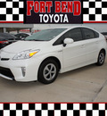 toyota prius 2012 white hatchback three hybrid 4 cylinders front wheel drive automatic 77469