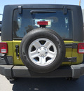 jeep wrangler unlimited 2010 green suv sport gasoline 6 cylinders 4 wheel drive automatic 79925