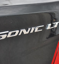 chevrolet sonic 2012 black sedan lt gasoline 4 cylinders front wheel drive 6 speed automatic 75067