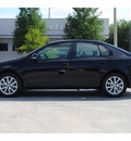volkswagen jetta 2010 black hatchback limited edition gasoline 5 cylinders front wheel drive automatic 77002
