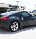nissan 370z 2011 black coupe gasoline 6 cylinders rear wheel drive 6 speed manual 76011