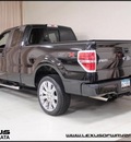 ford f 150 2010 black stx gasoline 8 cylinders 4 wheel drive automatic with overdrive 55391