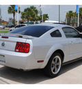 ford mustang 2006 silver coupe v6 premium gasoline 6 cylinders rear wheel drive automatic with overdrive 77065