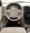 kia sedona 2004 white van lx gasoline 6 cylinders front wheel drive automatic with overdrive 76087