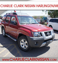 nissan xterra 2010 dk  red suv gasoline 6 cylinders 2 wheel drive automatic 78552