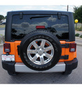 jeep wrangler 2012 orange suv sahara gasoline 6 cylinders 4 wheel drive automatic 78006